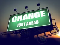 Change Just Ahead - Green Billboard on the Rising Sun Background.